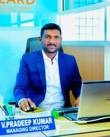 Vadla Pradeep Kumar, Managing Director of Wizard Infra Solutions, at his office desk
